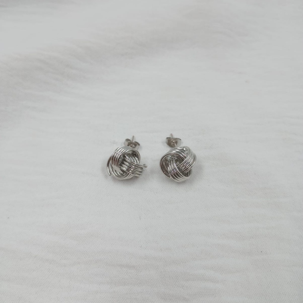 Aro en forma de nudo acero dorado y plateado